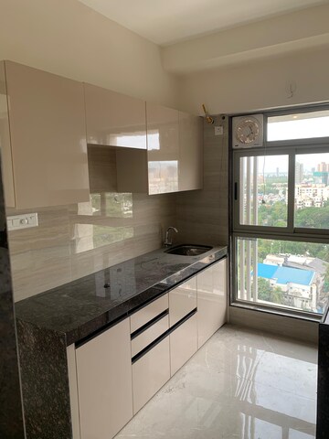 Kitchen in 1 BHK Apartment at Ajmera Boulevard, Malad West – for Rent