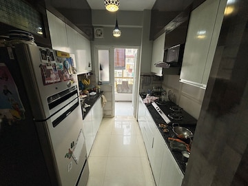 Kitchen in 3 BHK Apartment at Samridhi Luxuriya Avenue, Sector 150 – for Sale