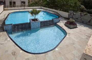 Swimming Pool in 1 BHK Apartment at Puranik Hometown, Ghodbunder Road – for Rent