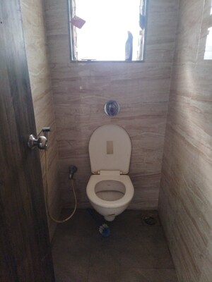 Bathroom in Studio Apartment at Squarefeet Joy square, Kasarvadavali – for Sale