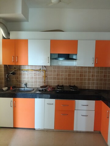 Kitchen in 2.5 BHK Apartment at Mahagun Mywoods, Sector 16c Greater Noida – for Rent