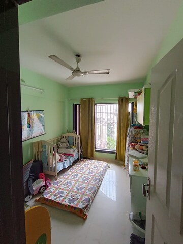 Bedroom in 2 BHK Apartment at Atul Blue Empire, Kandivali West – for Rent