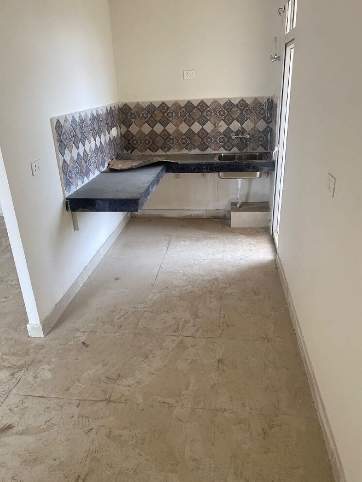 Kitchen, signature-global-golf-greens 2.5 Bedroom 1000 Sq.Ft. Apartment In Sector 79 Gurgaon 8912948