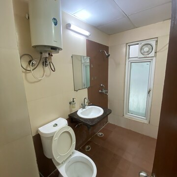 Bathroom in 2.5 BHK Apartment at Mahagun Moderne, Sector 78 – for Rent