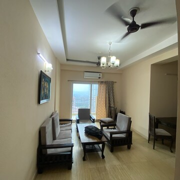 Living Room in 2.5 BHK Apartment at Mahagun Moderne, Sector 78 – for Rent