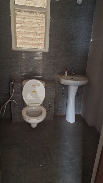 Bathroom in 3 BHK Apartment at Jankipuram Extension – for Rent