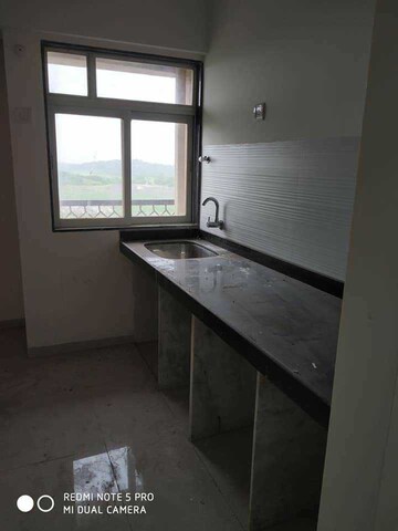 Kitchen in 1 BHK Apartment at Squarefeet Ace Square, Ghodbunder Road – for Rent