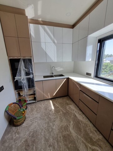 Kitchen in 3 BHK Apartment at Mahagun Mezzaria, Sector 78 – for Rent