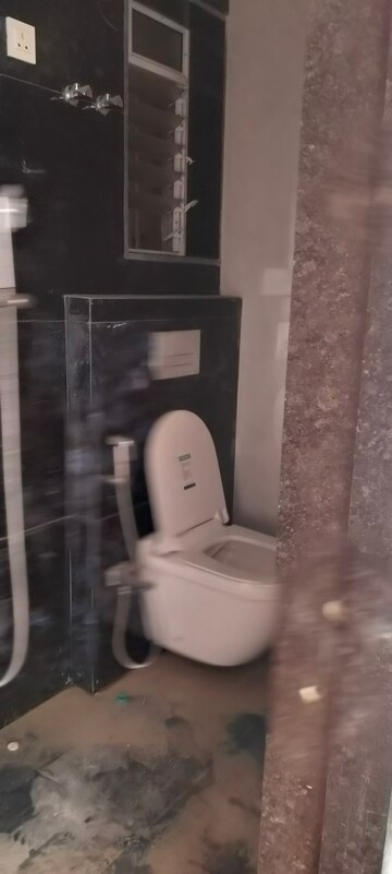 Bathroom in 3 BHK Apartment at Seawoods Sector 40 – for Rent