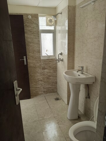 Bathroom in 3 BHK Apartment at Amrapali Terrace Homes, Tech Zone 4 Greater Noida – for Rent