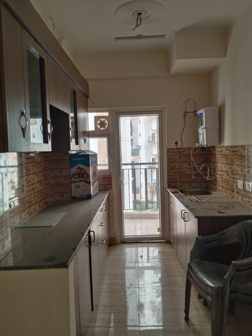 Kitchen in 3 BHK Apartment at Amrapali Terrace Homes, Tech Zone 4 Greater Noida – for Rent