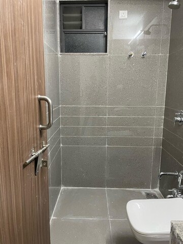 Bathroom in 3 BHK Apartment at Shivalik Sharda Park View, Shela – for Rent