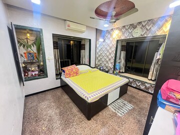 Bedroom in 2 BHK Apartment at Dheeraj Darshan, Jogeshwari East – for Rent