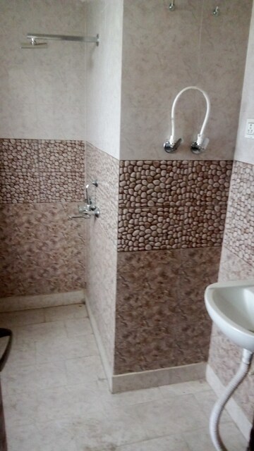 Bathroom in 2 BHK Apartment at Parker White Lily, Sector 8 – for Rent
