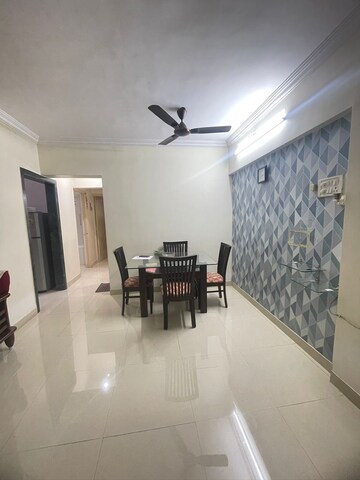 Living Room in 2 BHK Apartment at Charkop Gaon – for Sale