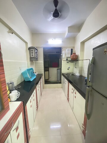 Kitchen in 2 BHK Apartment at Charkop Gaon – for Sale
