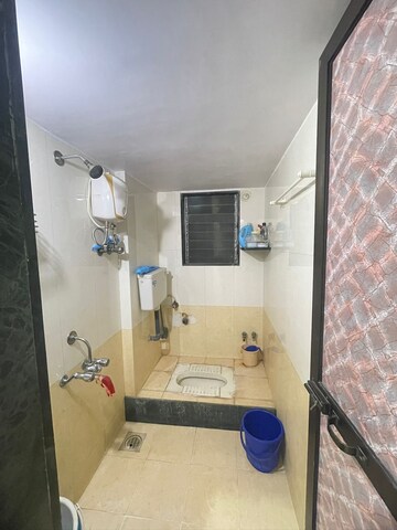 Bathroom in 2 BHK Apartment at Charkop Gaon – for Sale