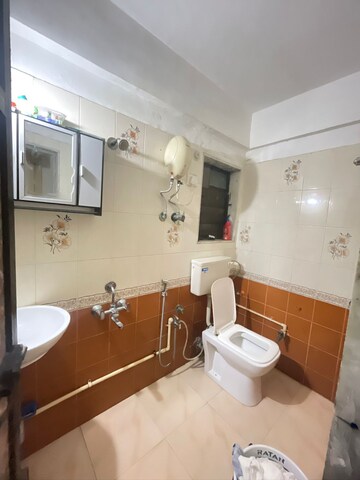 Bathroom in 2 BHK Apartment at Charkop Gaon – for Sale