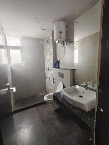 Bathroom in 4 BHK Apartment at Shapoorji Pallonji Joyville Phase 2, Sector 102 – for Rent