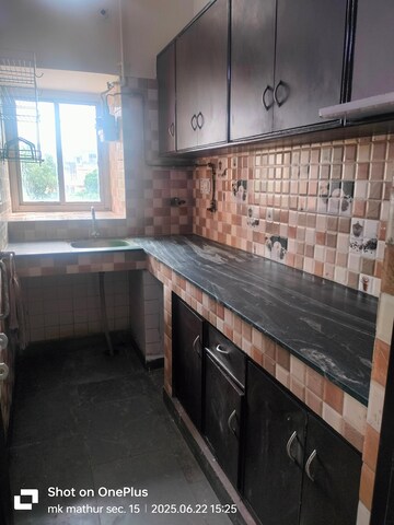 Kitchen in 2 BHK Apartment at Rail Vihar Apartment, Sector 15 – for Rent