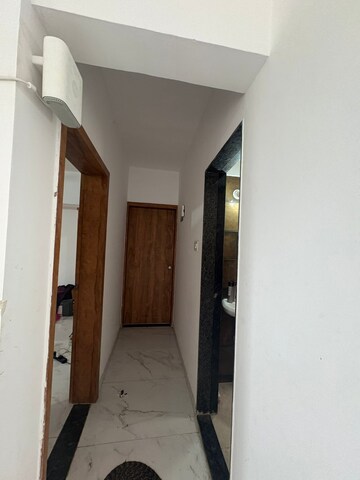 Building Lobby in 2 BHK Apartment at Satyam Serenity, Wadgaon Sheri – for Rent