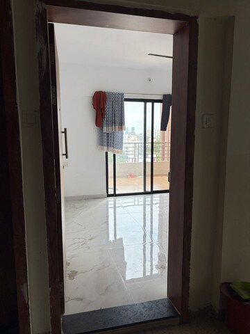 Bedroom in 2 BHK Apartment at Satyam Serenity, Wadgaon Sheri – for Rent