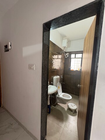 Bathroom in 2 BHK Apartment at Satyam Serenity, Wadgaon Sheri – for Rent