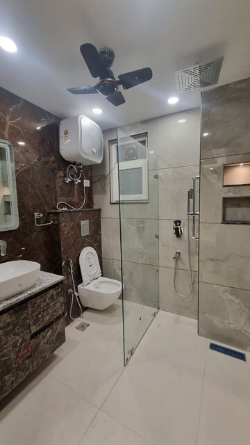 Bathroom in 3 BHK Builder Floor at South Extension I – for Sale