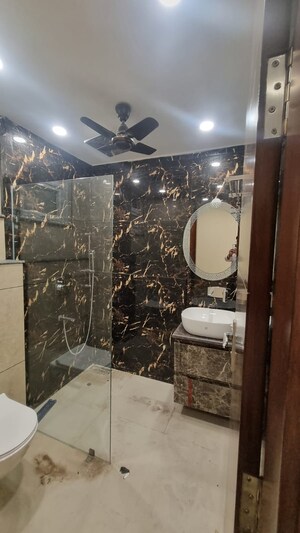 Bathroom in 3 BHK Builder Floor at South Extension I – for Sale