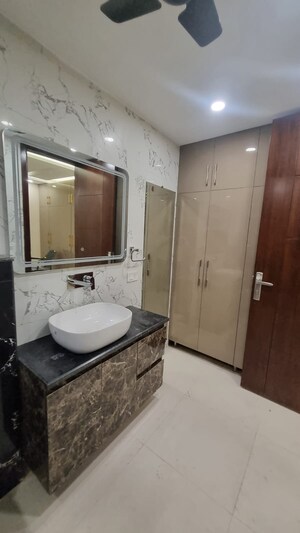 Bathroom in 3 BHK Builder Floor at South Extension I – for Sale