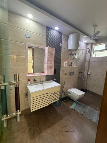 Bathroom in 3 BHK Builder Floor at Kalkaji – for Rent