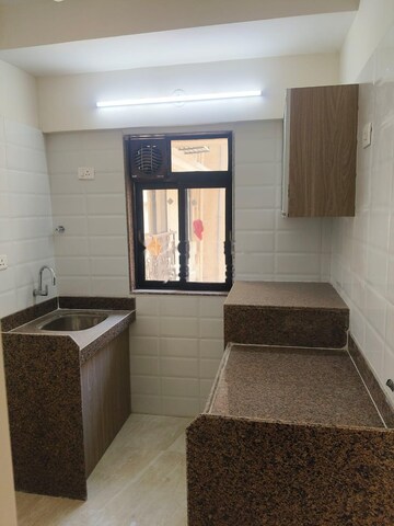 Kitchen in 1.5 BHK Apartment at Chandiwala Pearl Regency, Andheri West – for Rent