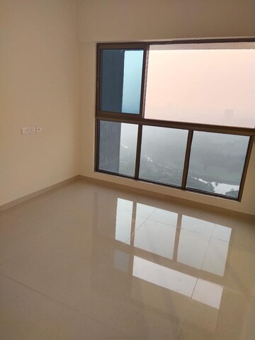 Living Room in 2 BHK Apartment at Raj Infinia, Malad West – for Rent