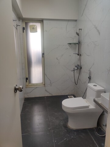 Bathroom in 4 BHK Apartment at Jinam Lovely CHS, Malad East – for Rent