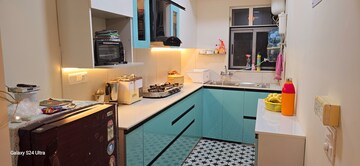 Kitchen in 3 BHK Apartment at Ashiana Umang, Jhai – for Rent