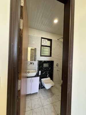 Attached Bathroom in 3 BHK Apartment at Aman Vihar – for Sale