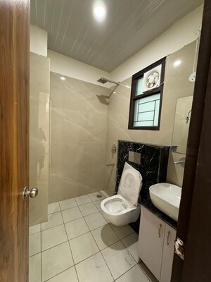 Bathroom in 3 BHK Apartment at Aman Vihar – for Sale