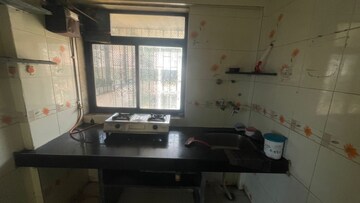 Kitchen in 1 BHK Apartment at Bhumiraj Abode, Sanpada – for Rent
