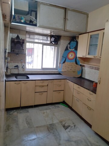 Kitchen in 1 BHK Apartment at Sunflower Co Op Hsg Soc, Mira Road – for Sale