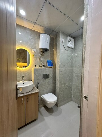 Bathroom in Studio Apartment at Kaveri City Center, Delta I Greater Noida – for Sale