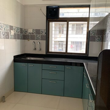 Kitchen in 1.5 BHK Apartment at Shankh Abhiman Apartment, Kastur Park – for Sale