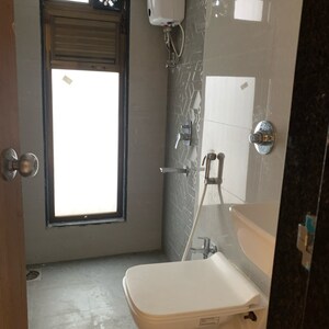 Bathroom in 1.5 BHK Apartment at Shankh Abhiman Apartment, Kastur Park – for Sale