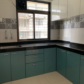 Kitchen in 1.5 BHK Apartment at Shankh Abhiman Apartment, Kastur Park – for Sale