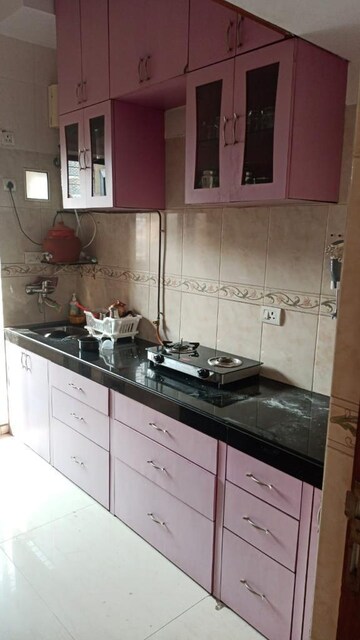 Kitchen in 1 BHK Apartment at K Raheja Heights, Malad East – for Rent