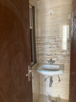 Bathroom in 2 BHK Apartment at Amrapali Golf Homes, Sector 4 Greater Noida – for Sale