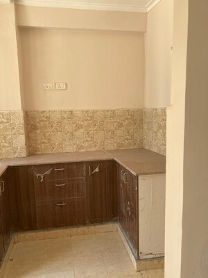 Kitchen in 2 BHK Apartment at Amrapali Golf Homes, Sector 4 Greater Noida – for Sale