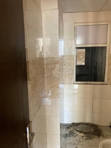 Bathroom in 2 BHK Apartment at Amrapali Golf Homes, Sector 4 Greater Noida – for Sale