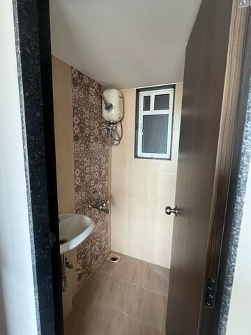 Bathroom in 1 BHK Apartment at JP North Aviva, Mira Road – for Rent