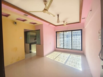 Living Room in 1 BHK Apartment at Agarwal Vrindavan Gardens, Nalasopara East – for Rent