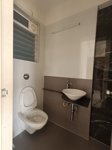 Bathroom in 1 BHK Apartment at Strawberry The Address, Mira Road East – for Rent